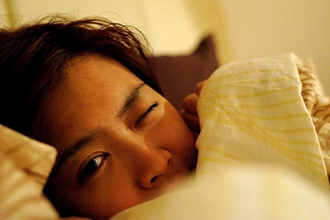 Reasons Behind Sleeping With One Eye Open